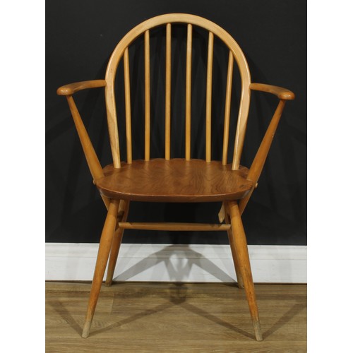 118 - Three Ercol Windsor arm chairs, the largest 88.5cm high, 66.5cm wide, the seat 41cm wide and 35cm de... 