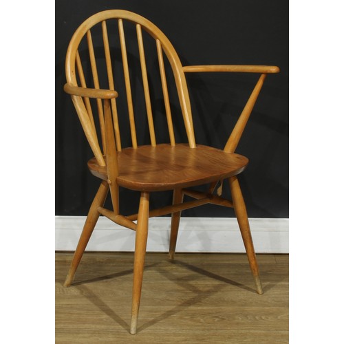 118 - Three Ercol Windsor arm chairs, the largest 88.5cm high, 66.5cm wide, the seat 41cm wide and 35cm de... 