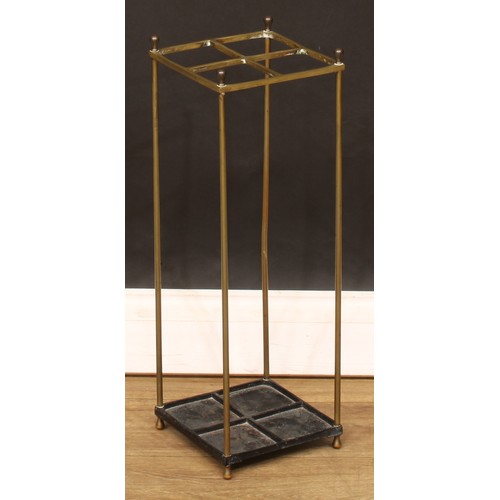 119 - An early 20th century brass and cast iron four-section walking stick or umbrella stand, of small and... 