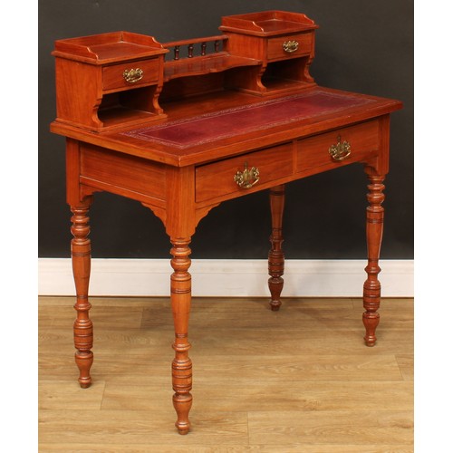 207 - A writing desk, shaped superstructure with two small drawers, rectangular top with inset tooled and ... 