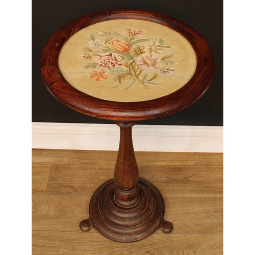 214 - A rosewood occasional table, circular top with embroidered panel, turned column, stepped circular ba... 