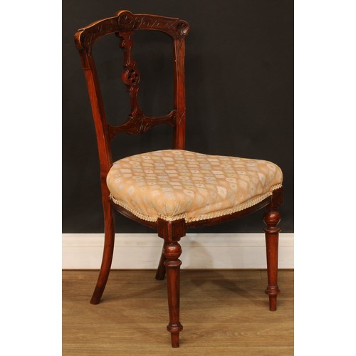 219 - A set of four Victorian Aesthetic Movement dining chairs, 86cm high, 46cm wide, the seat 35cm deep (... 