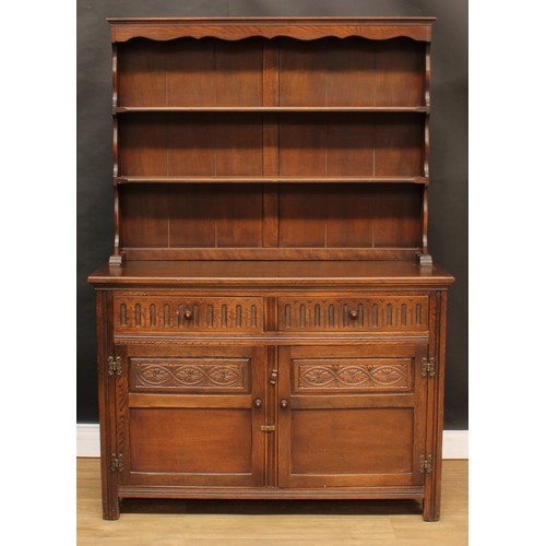 596 - A Jaycee oak dresser, 174cm high, 122cm wide, 43cm deep; a similar side cabinet, 85cm high, 79cm wid... 