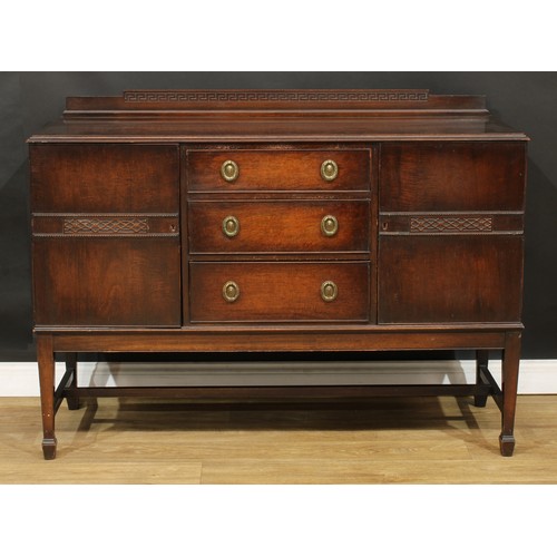 597 - A mahogany sideboard, retailed by T. B. and W. Cockayne, Sheffield, 102cm high, 138.5cm wide, 52.5cm... 