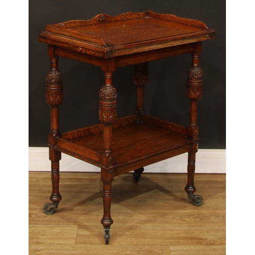 601 - An oak after-dinner or dessert combination serving trolley and card table, hinged top enclosing a ba... 