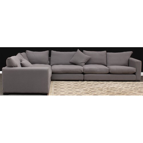 604 - A corner sofa, 88cm high, 382cm wide, 279cm deep