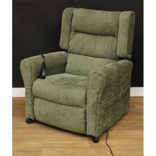 606 - A contemporary electric recliner armchair, 109cm high, 92cm wide, the seat 55cm wide and 52cm deep