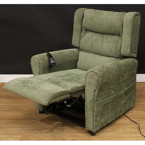 606 - A contemporary electric recliner armchair, 109cm high, 92cm wide, the seat 55cm wide and 52cm deep