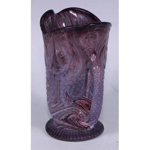 158 - A late 19th century pressed slag glass jug or vase, modelled in the form of a fish, the tail formed ... 