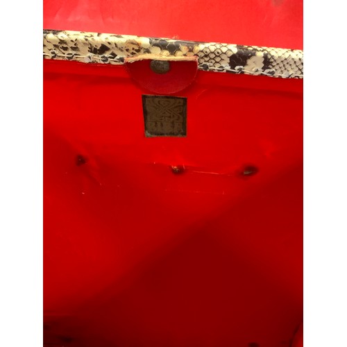 226 - Biba  - a tall narrow luggage trunk with snake effect exterior and leather handle, red lined interio... 