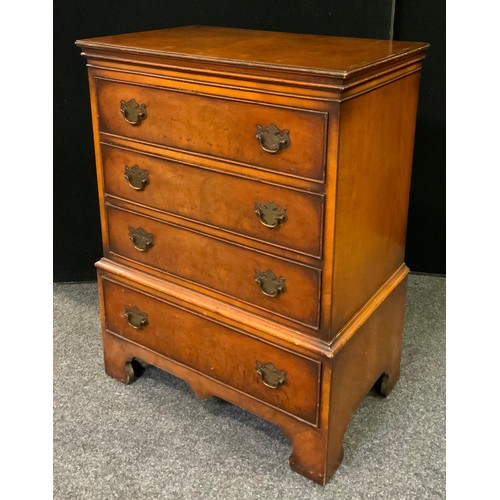 238 - A George III style walnut chest of drawers, four long drawers, bracket feet, brass swan-neck handles... 