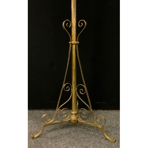 242 - An early 20th century brass rise-and-fall standard lamp.