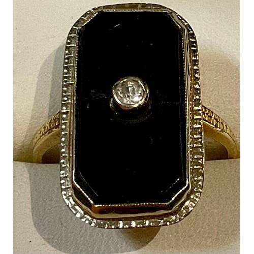 387 - An 18k gold mourning type jet and diamond ring, size Q, 5.5g, late 19th/early 20th century