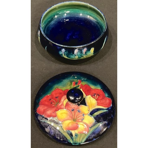 20 - A Moorcroft Orchid pattern circular powder bowl and cover, 12.5cm diameter, impressed marks