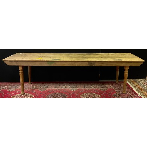 236 - A 19th century collapsible pine table, triple plank top, plain frieze turned tapering legs, 75cm hig... 