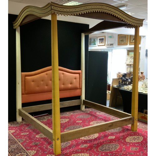 241 - A painted four poster super king size double bed, arched carved and painted top rails, tapering fabr... 