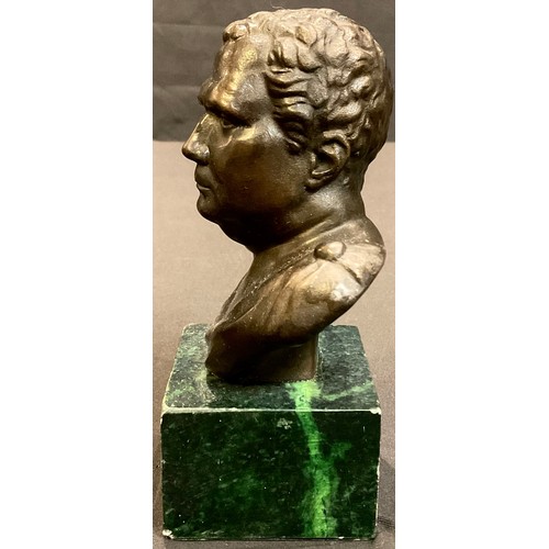 52 - Contemporary Italian School, a bronzed metal bust, of a Roman, green verdigris base, 14.5cm high