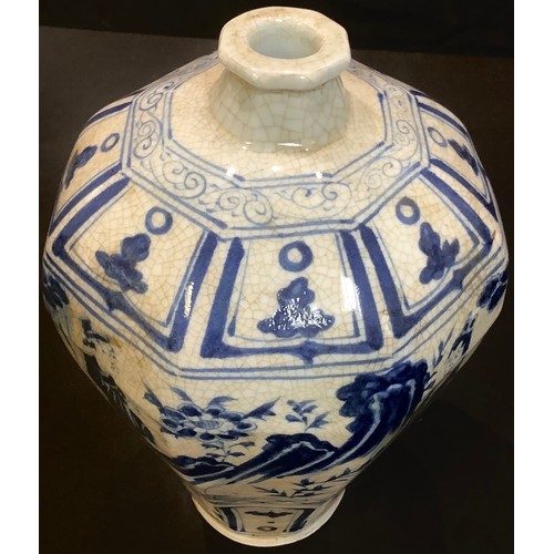 89 - A Korean style octagonal inverted baluster blue and white vase, painted with a continuous garden lan... 