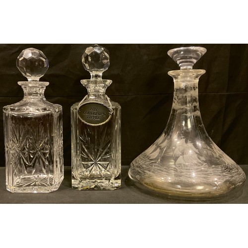 131 - A glass ship's decanter, acid etched with tall ships, 25cm; an Edinburgh Crystal cut glass decanter,... 