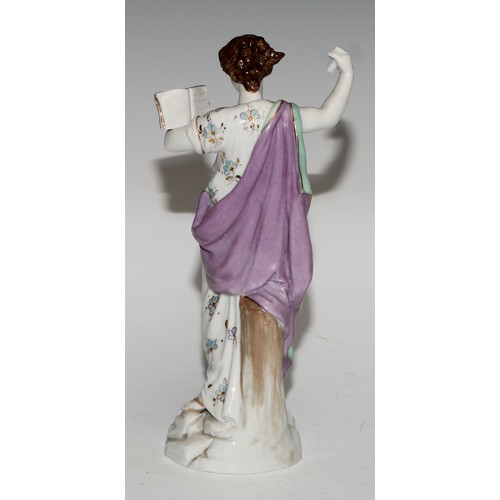 761 - A German porcelain figure, probably Meissen, of a saint, possibly Saint Dominic, modelled wearing th... 