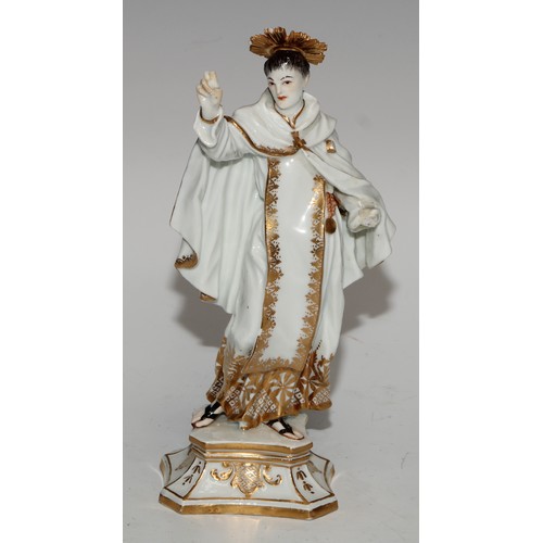 761 - A German porcelain figure, probably Meissen, of a saint, possibly Saint Dominic, modelled wearing th... 