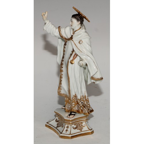 761 - A German porcelain figure, probably Meissen, of a saint, possibly Saint Dominic, modelled wearing th... 