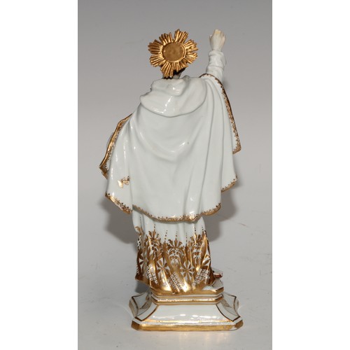 761 - A German porcelain figure, probably Meissen, of a saint, possibly Saint Dominic, modelled wearing th... 