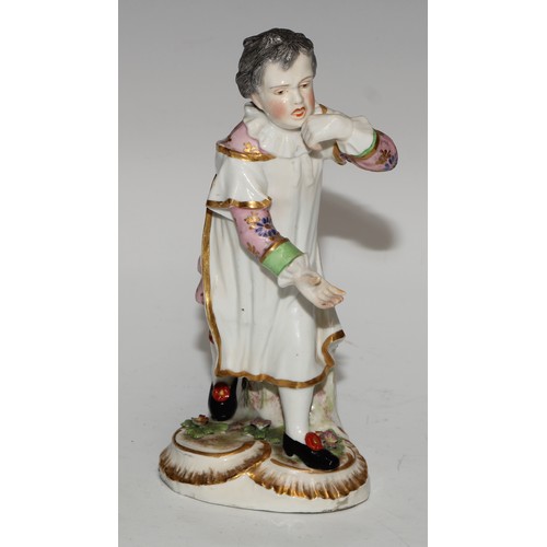 761 - A German porcelain figure, probably Meissen, of a saint, possibly Saint Dominic, modelled wearing th... 