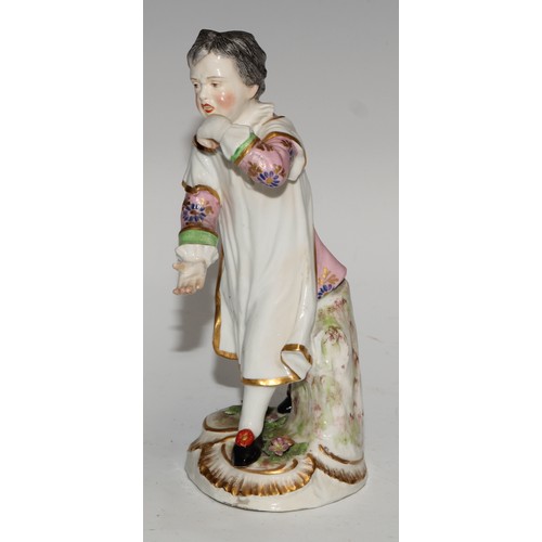 761 - A German porcelain figure, probably Meissen, of a saint, possibly Saint Dominic, modelled wearing th... 