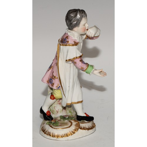 761 - A German porcelain figure, probably Meissen, of a saint, possibly Saint Dominic, modelled wearing th... 