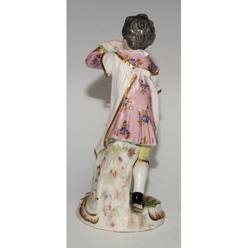 761 - A German porcelain figure, probably Meissen, of a saint, possibly Saint Dominic, modelled wearing th... 