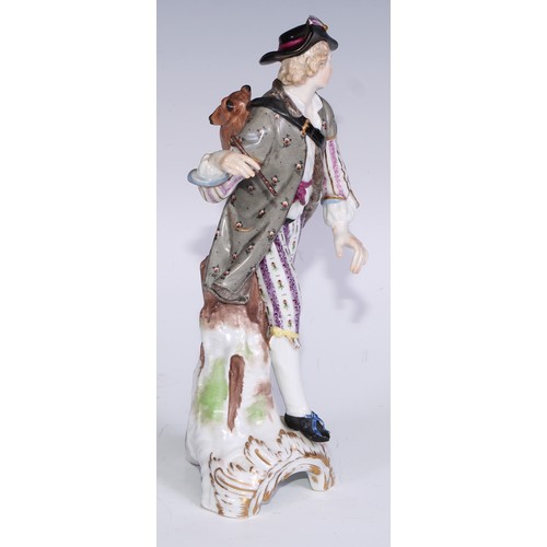 741 - A pair of Continental porcelain figures, fruit sellers, in the 18th century taste, 20.5cm high, blue... 