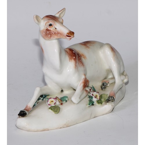 695 - A Derby patch mark model, of a doe, the shaped base applied with flowering boccage, 16cm long, c.177... 