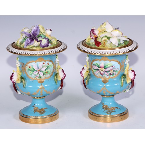 583 - A pair of Lynton Porcelain Company pedestal campana vases, painted by Stefan Nowacki, signed, with b... 