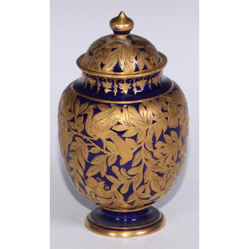 714 - A pair of Royal Crown Derby ovoid vases and covers, decorated in gilt with birds and butterflies amo... 