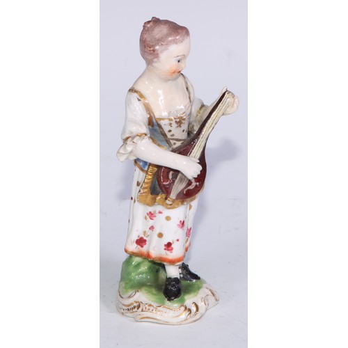 711 - A pair of Derby figures, Companion Gardeners, she with watering cans, he with a plant pot, the talle... 