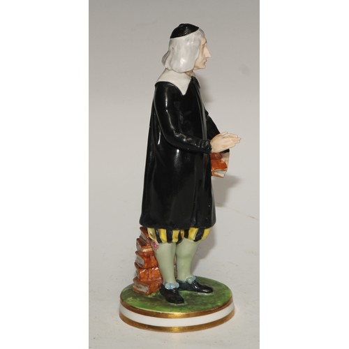 592 - A Derby Crown Porcelain figure, San Grada, modelled with his books, 17cm high, printed mark, c.1880