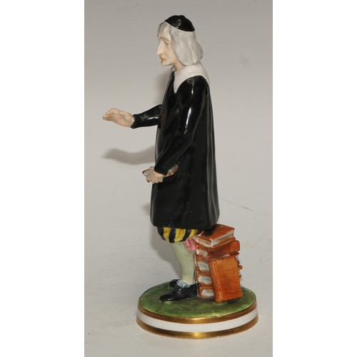 592 - A Derby Crown Porcelain figure, San Grada, modelled with his books, 17cm high, printed mark, c.1880