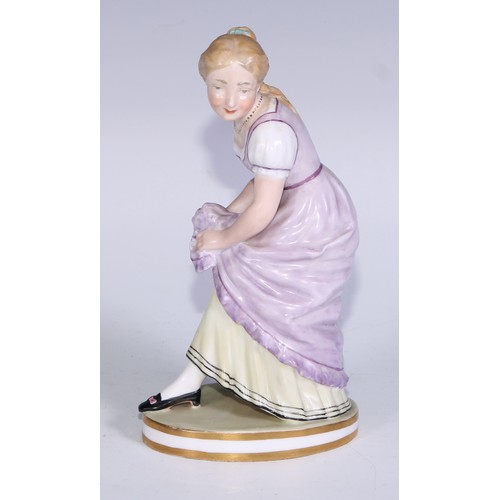 679 - A Derby figure, of a post-Regency lady of fashion, circular base, 20.5cm high, red crown over Derby ... 