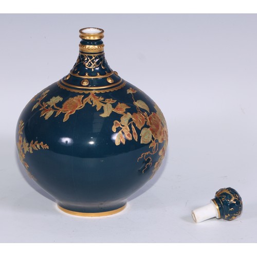 628 - A Royal Crown Derby compressed globular bottle vase and stopper, decorated in green and gilt with fl... 