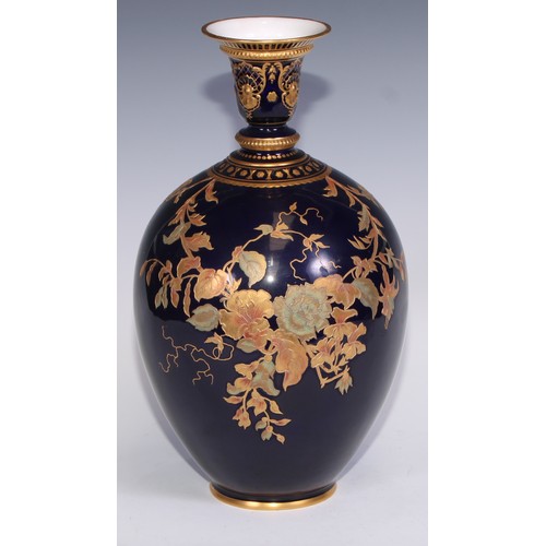 657 - A Royal Crown Derby two-handled ovoid vase and cover, printed in polychrome and gilt with flowers on... 