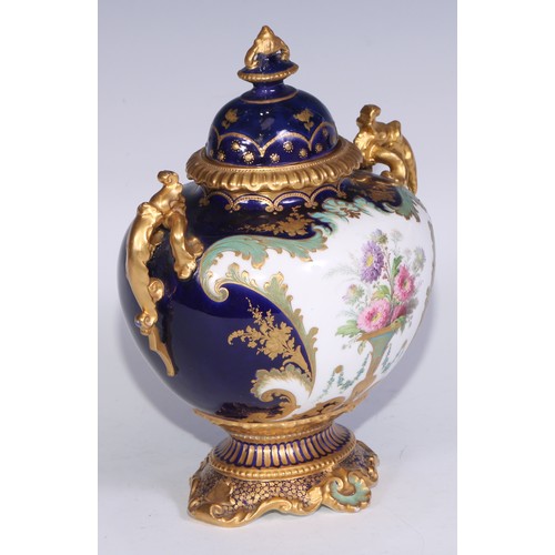 625 - ***LOT WITHDRAWN***A Royal Crown Derby  two handled pedestal  ovoid vase and cover, well painted by ... 