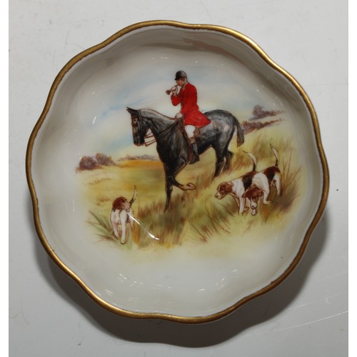 653 - A Royal Crown Derby roundel, decorated by M M Barlow, signed, with a fox hound, 8.5cm diam, printed ... 