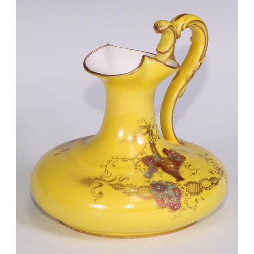 656 - A Royal Crown Derby two-handled boat shaped pedestal vase, moulded and decorated in gilt on a yellow... 