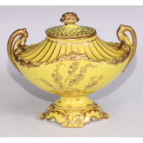 656 - A Royal Crown Derby two-handled boat shaped pedestal vase, moulded and decorated in gilt on a yellow... 