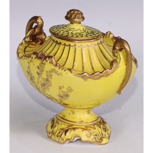 656 - A Royal Crown Derby two-handled boat shaped pedestal vase, moulded and decorated in gilt on a yellow... 