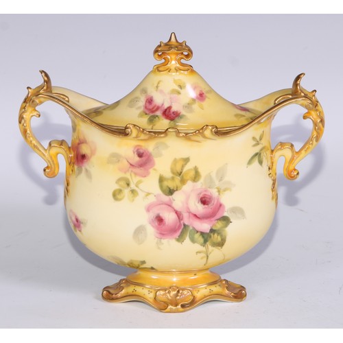 659 - A Royal Crown Derby two-handled vase, decorated with roses on a blush ground, 16.5cm wide, printed m... 