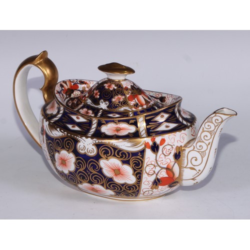 619 - A Royal Crown Derby 2451 pattern three piece tea service, comprising teapot, milk jug and sucrier, t... 