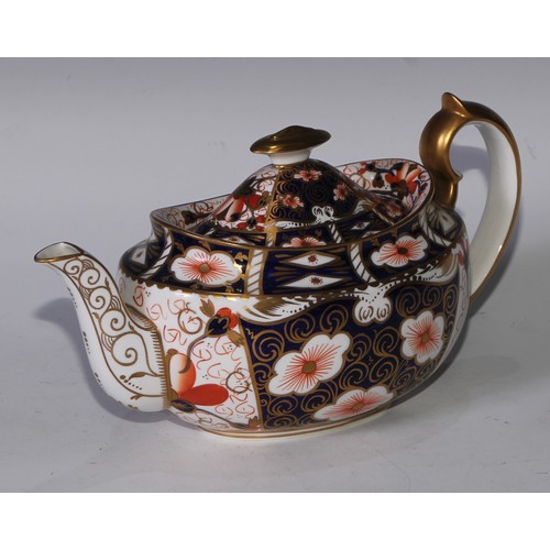 619 - A Royal Crown Derby 2451 pattern three piece tea service, comprising teapot, milk jug and sucrier, t... 