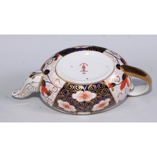 619 - A Royal Crown Derby 2451 pattern three piece tea service, comprising teapot, milk jug and sucrier, t... 